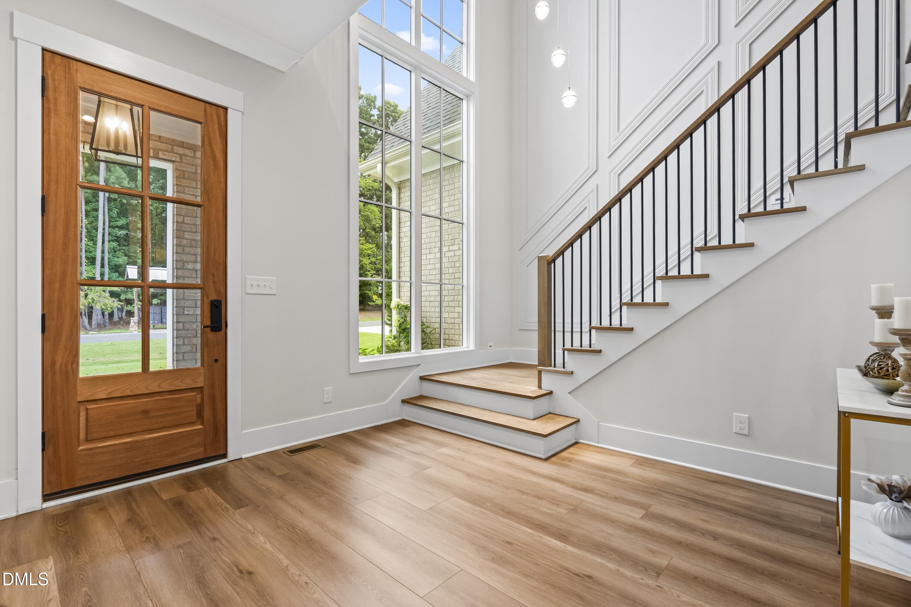 2205 Duskywing Drive Raleigh, NC 27613 - Photo 26 of 38 a view of entryway and hall with wooden floor