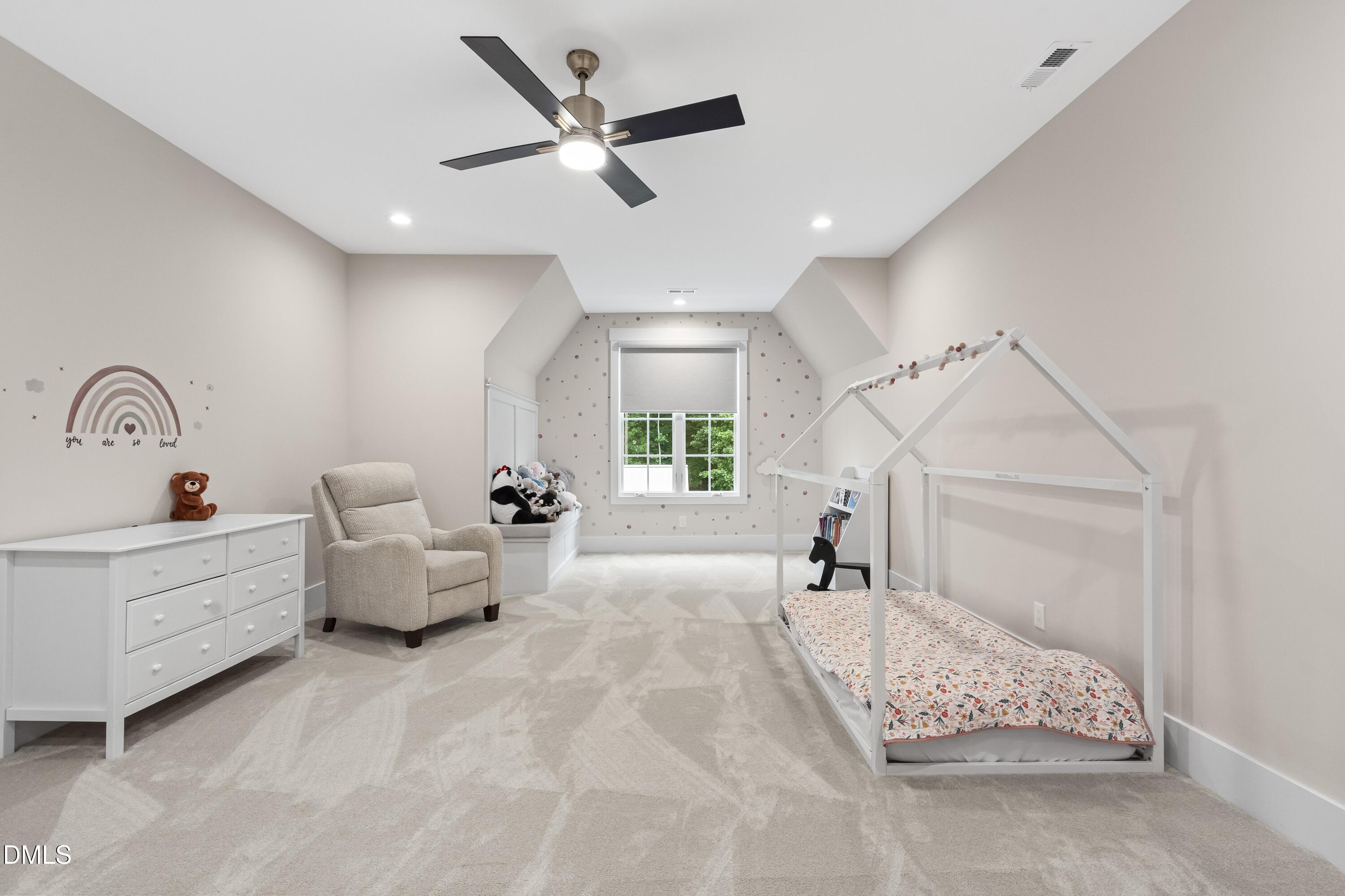 2205 Duskywing Drive Raleigh, NC 27613 - Photo 31 of 38 a bed room with a bed and a couch