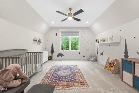 a view of porch with a table and chairs next to a window