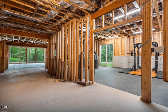 2205 Duskywing Drive Raleigh, NC 27613 - Photo 33 of 38 a view of porch with a table and chairs next to a window