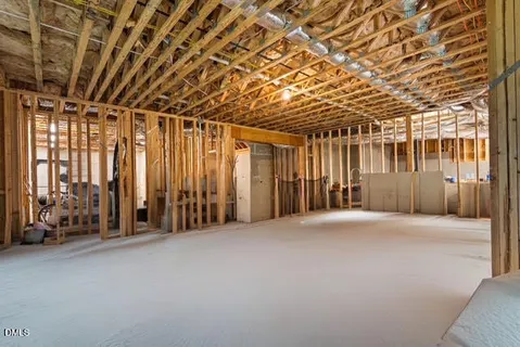 a view of an empty room with a sliding door