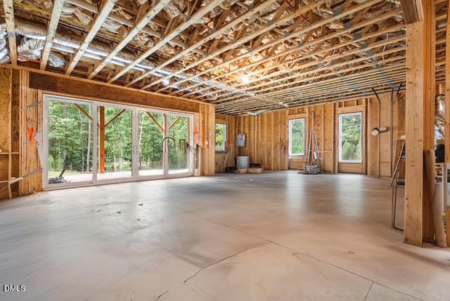 2205 Duskywing Drive Raleigh, NC 27613 - Photo 35 of 38 a view of an empty room with a sliding door