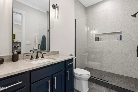 a view of a dining room with furniture wooden floor and chandelier