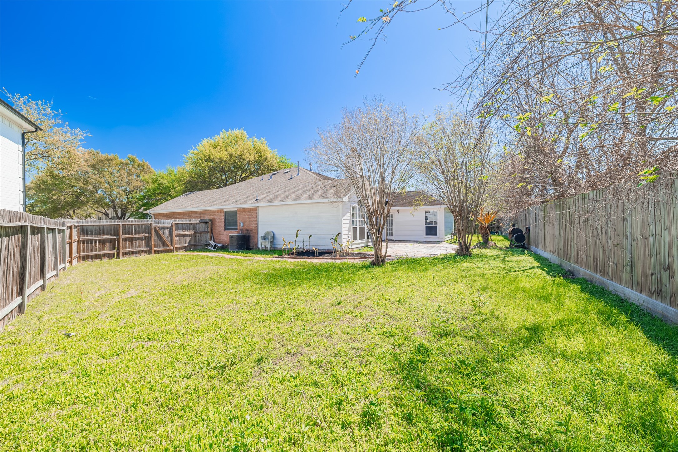 15022 Sapling Oak Court Houston, TX 77082 - Photo 29 of 32 a front view of a house with yard and swimming pool