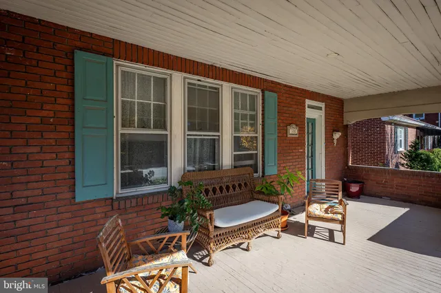 a view of a lounge chairs in the patio