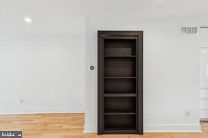 436 Brown Street Philadelphia, PA 19123 - Photo 11 of 62 a view of walk in closet with empty racks