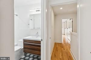 436 Brown Street Philadelphia, PA 19123 - Photo 29 of 62 a bathroom with a sink and a mirror