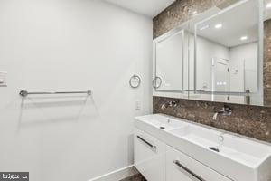 436 Brown Street Philadelphia, PA 19123 - Photo 32 of 62 a bathroom with a sink and a mirror