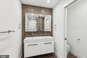 436 Brown Street Philadelphia, PA 19123 - Photo 34 of 62 a bathroom with a sink and a mirror