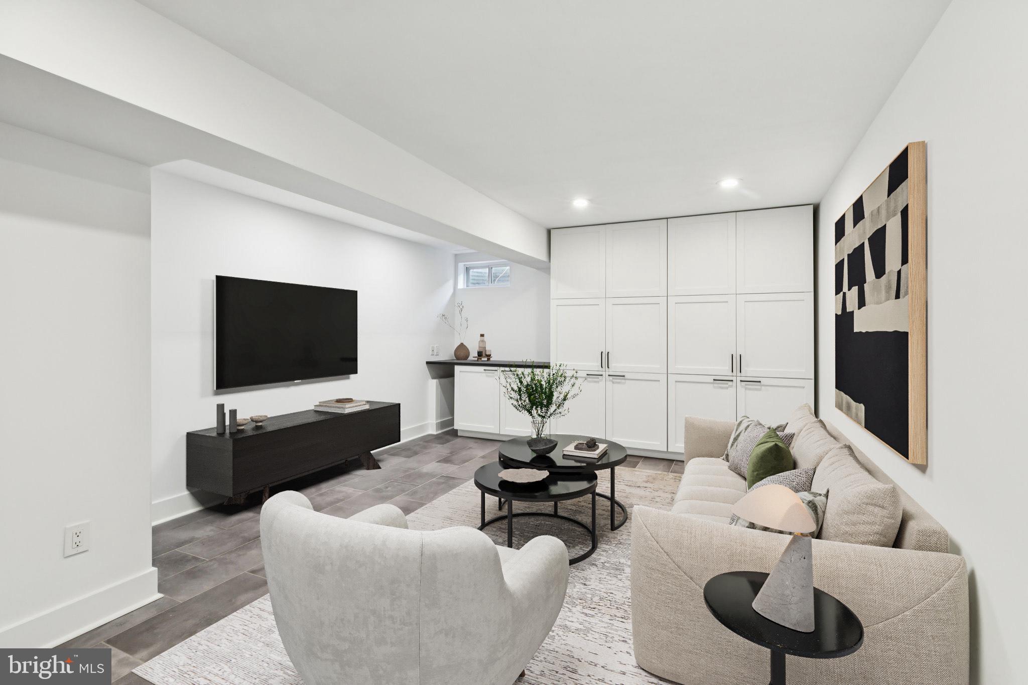 436 Brown Street Philadelphia, PA 19123 - Photo 43 of 62 a living room with furniture and a flat screen tv