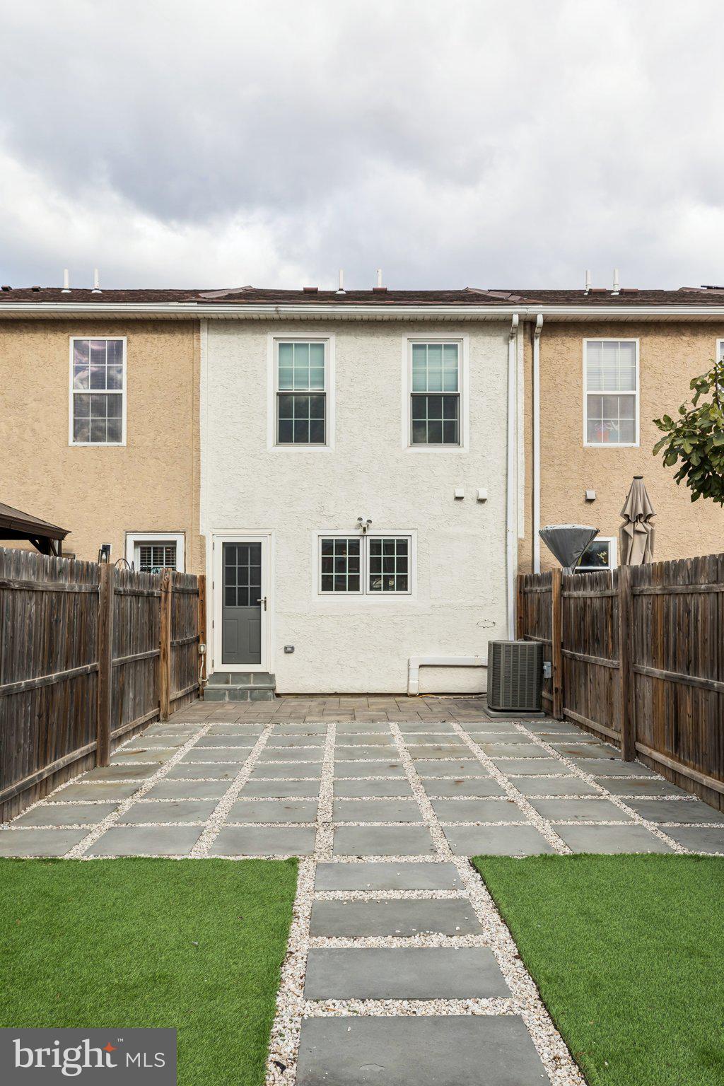 436 Brown Street Philadelphia, PA 19123 - Photo 54 of 62 a front view of a house with a yard
