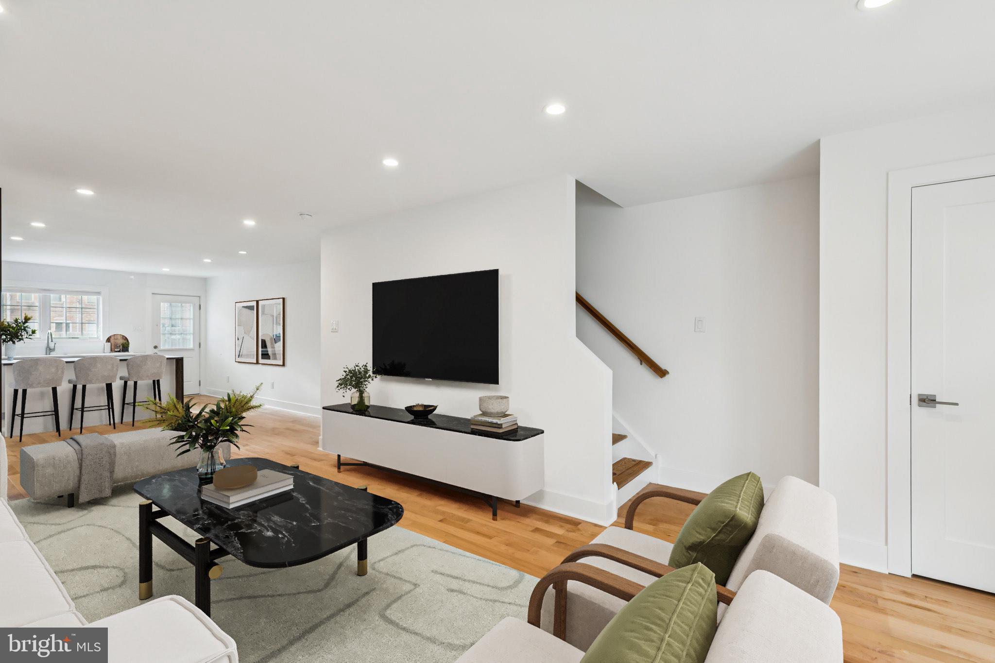436 Brown Street Philadelphia, PA 19123 - Photo 6 of 62 a living room with furniture and a flat screen tv