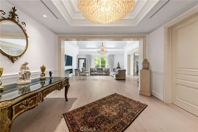 a spacious bathroom with a sink a mirror a bathtub and shower