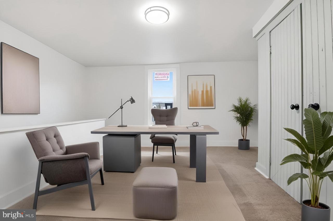 621 Wallace Street York, PA 17403 - Photo 26 of 53 a view of a livingroom with furniture and a potted plant