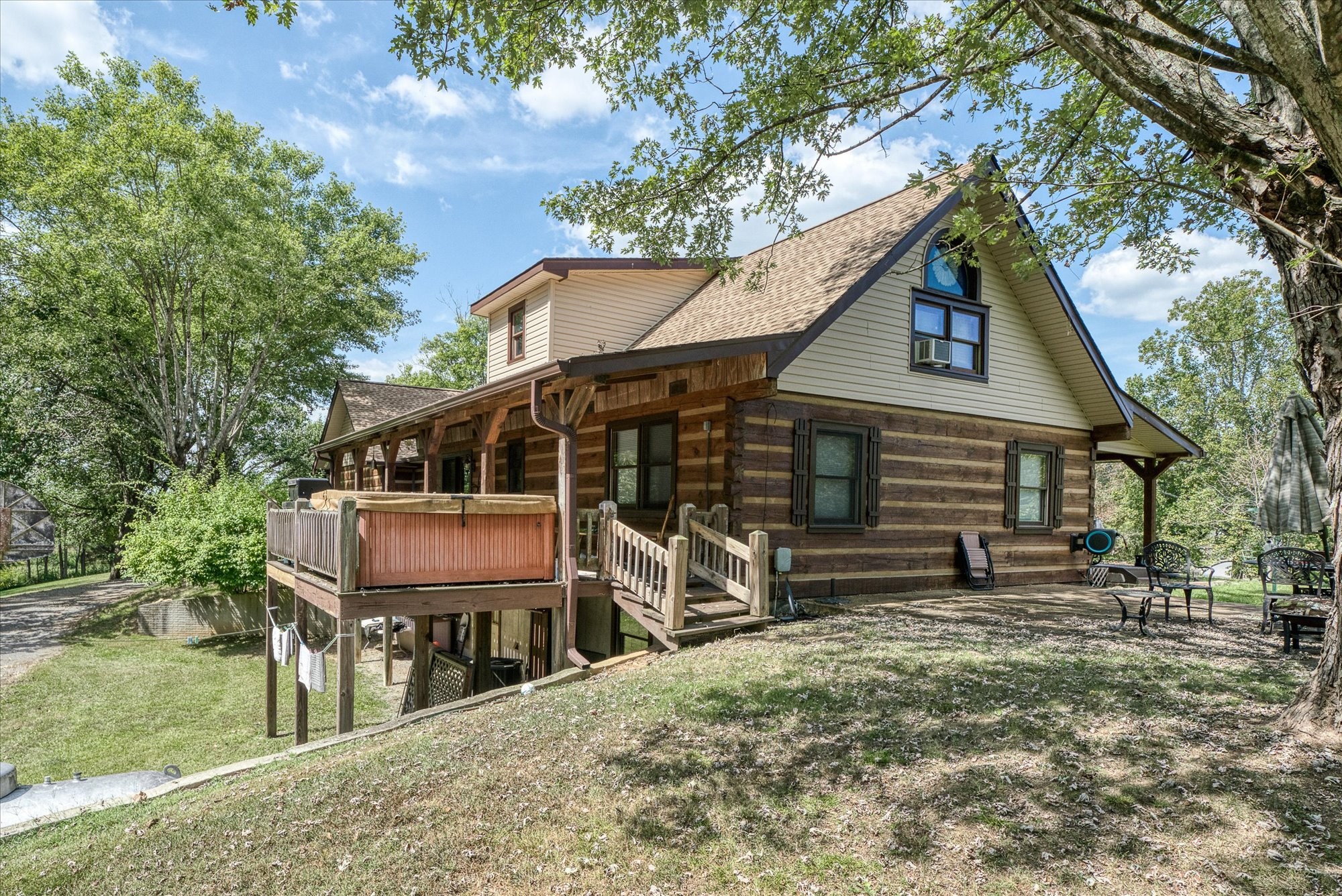 385 Paul Reecer Road Moss, TN 38575 - Photo 13 of 75 a front view of a house with a yard balcony and mountain view