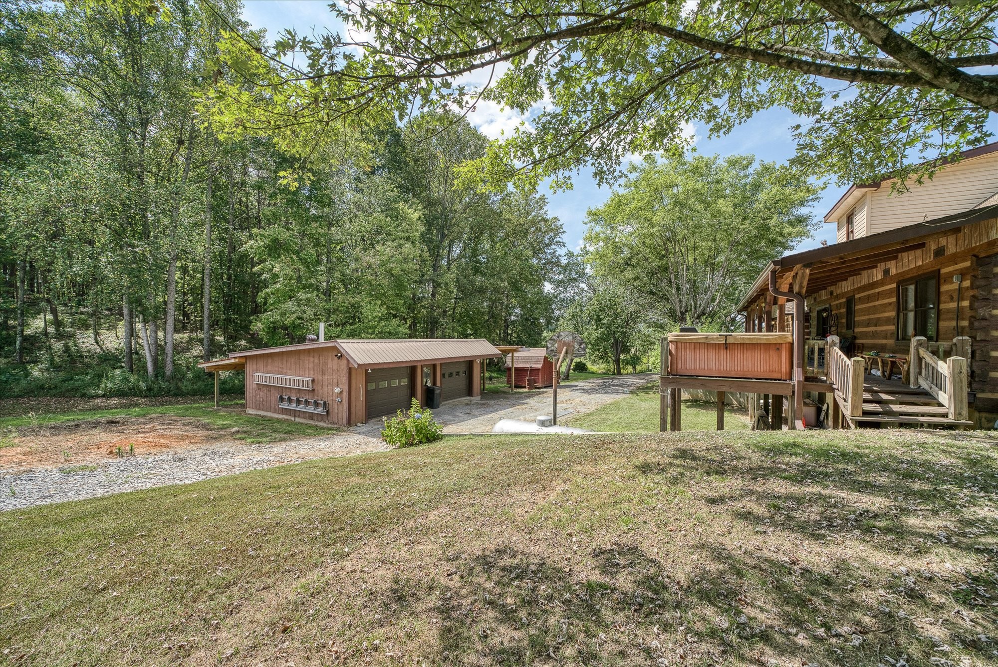 385 Paul Reecer Road Moss, TN 38575 - Photo 15 of 75 a view of a house with backyard porch and sitting area
