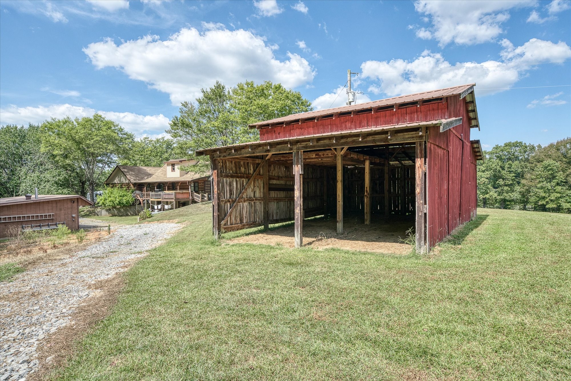 385 Paul Reecer Road Moss, TN 38575 - Photo 16 of 75 a view of a house with backyard and porch