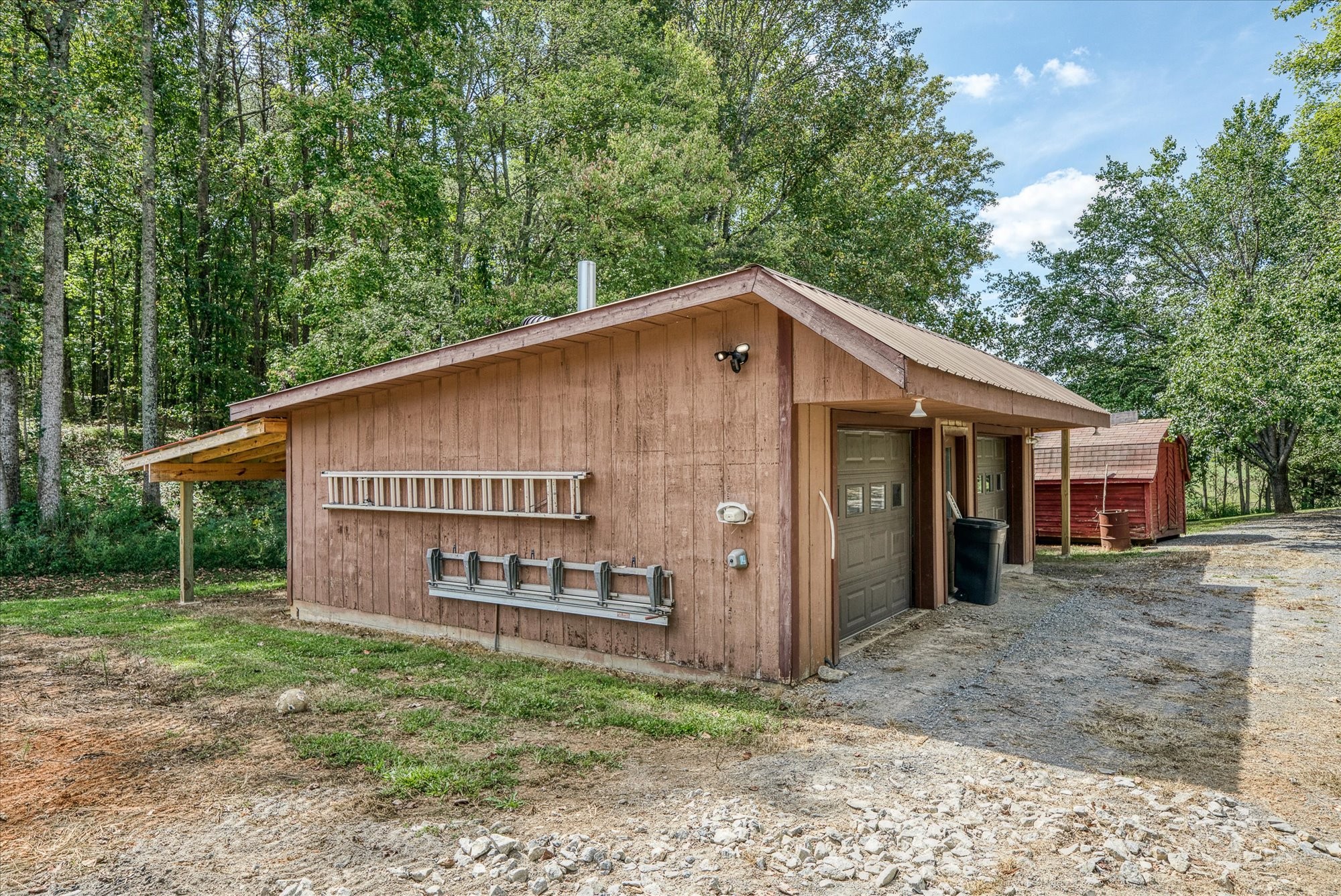 385 Paul Reecer Road Moss, TN 38575 - Photo 18 of 75 a view of a house with a yard and large tree