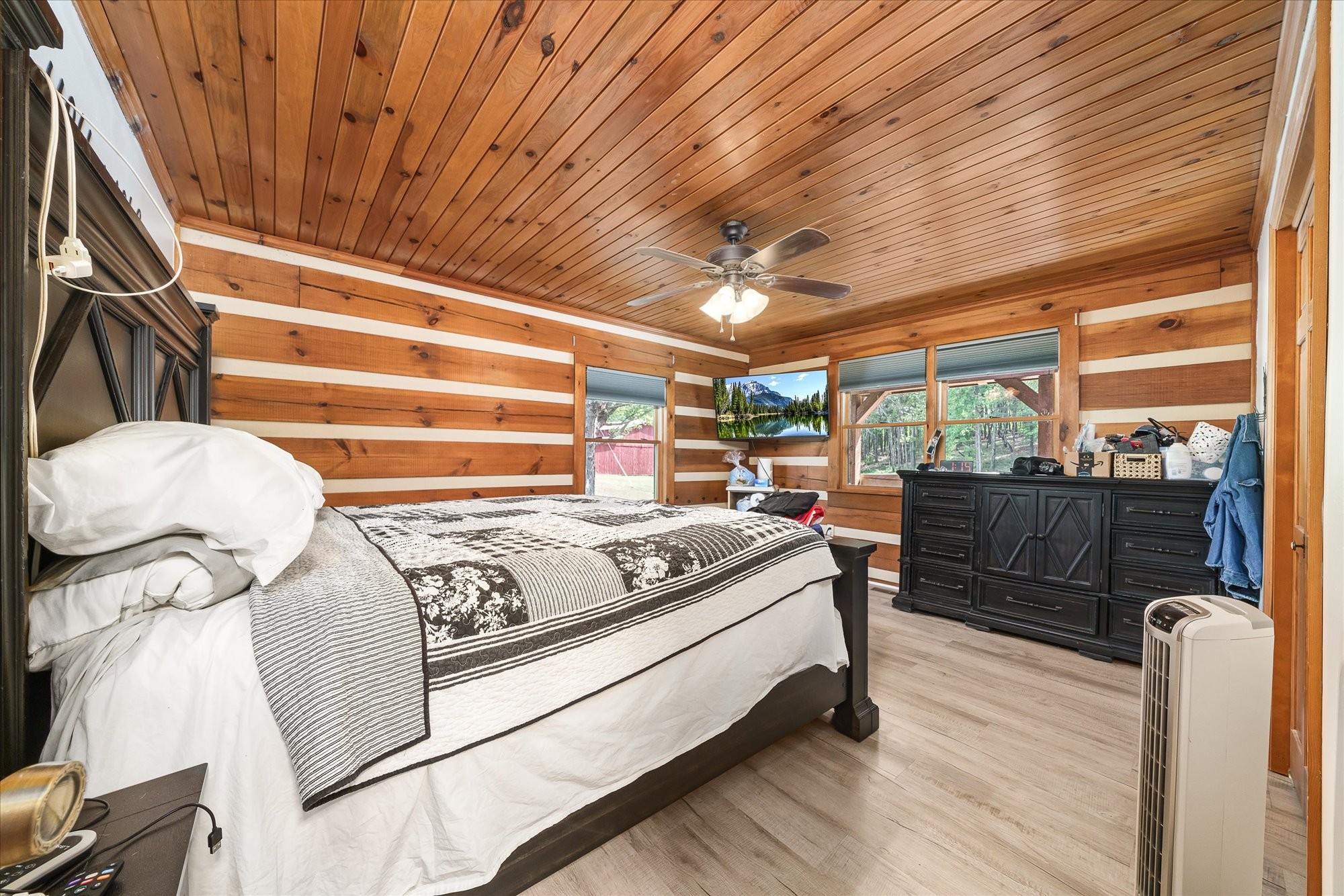 385 Paul Reecer Road Moss, TN 38575 - Photo 42 of 75 a bedroom with furniture and a wooden floor