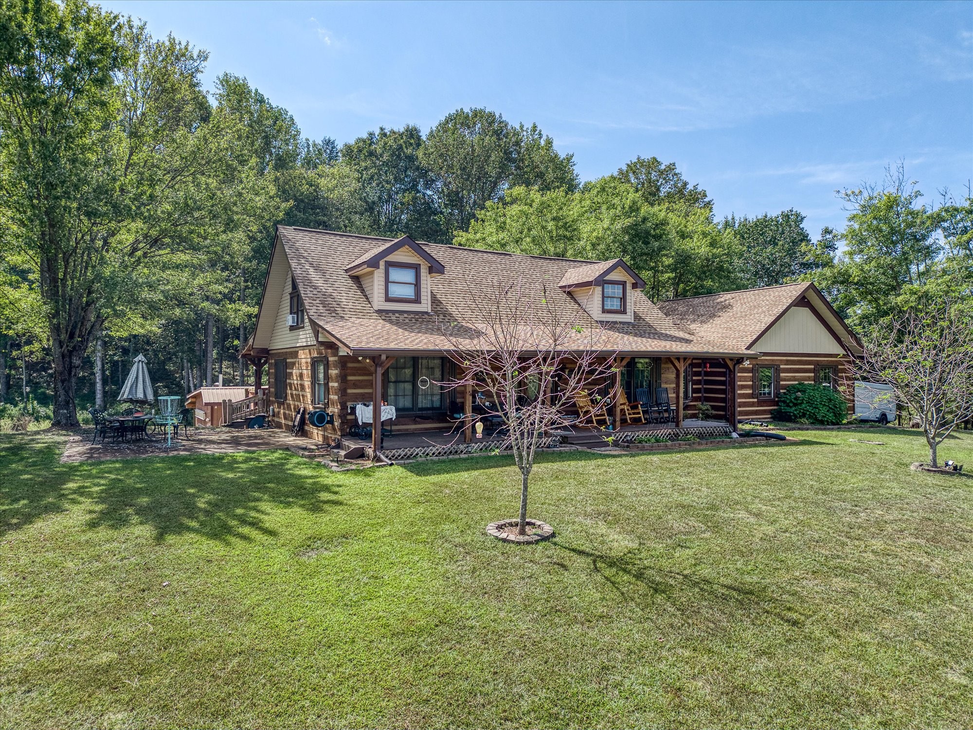 385 Paul Reecer Road Moss, TN 38575 - Photo 5 of 75 a view of a house with garden and sitting area