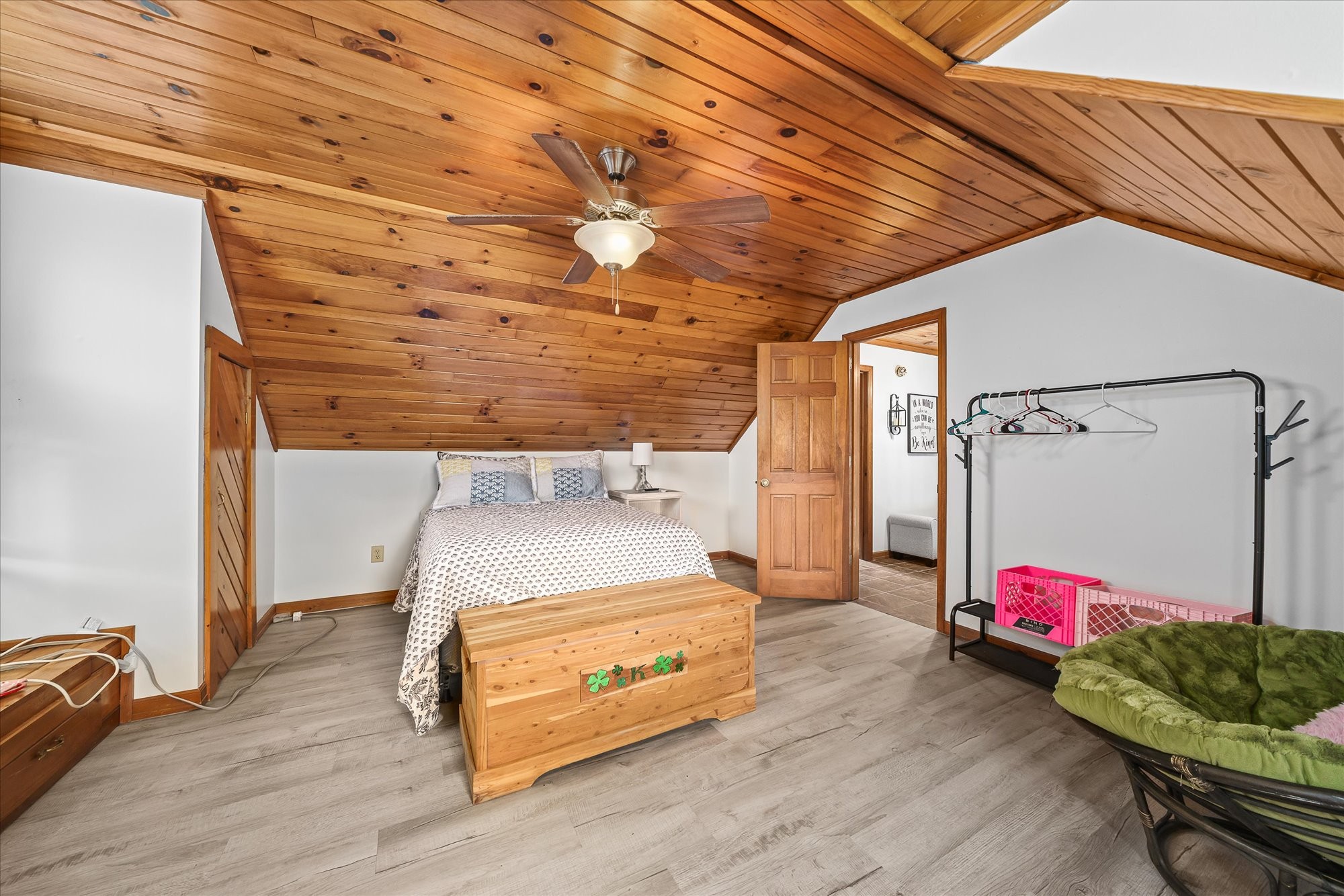 385 Paul Reecer Road Moss, TN 38575 - Photo 53 of 75 a bedroom with a bed and a chandelier