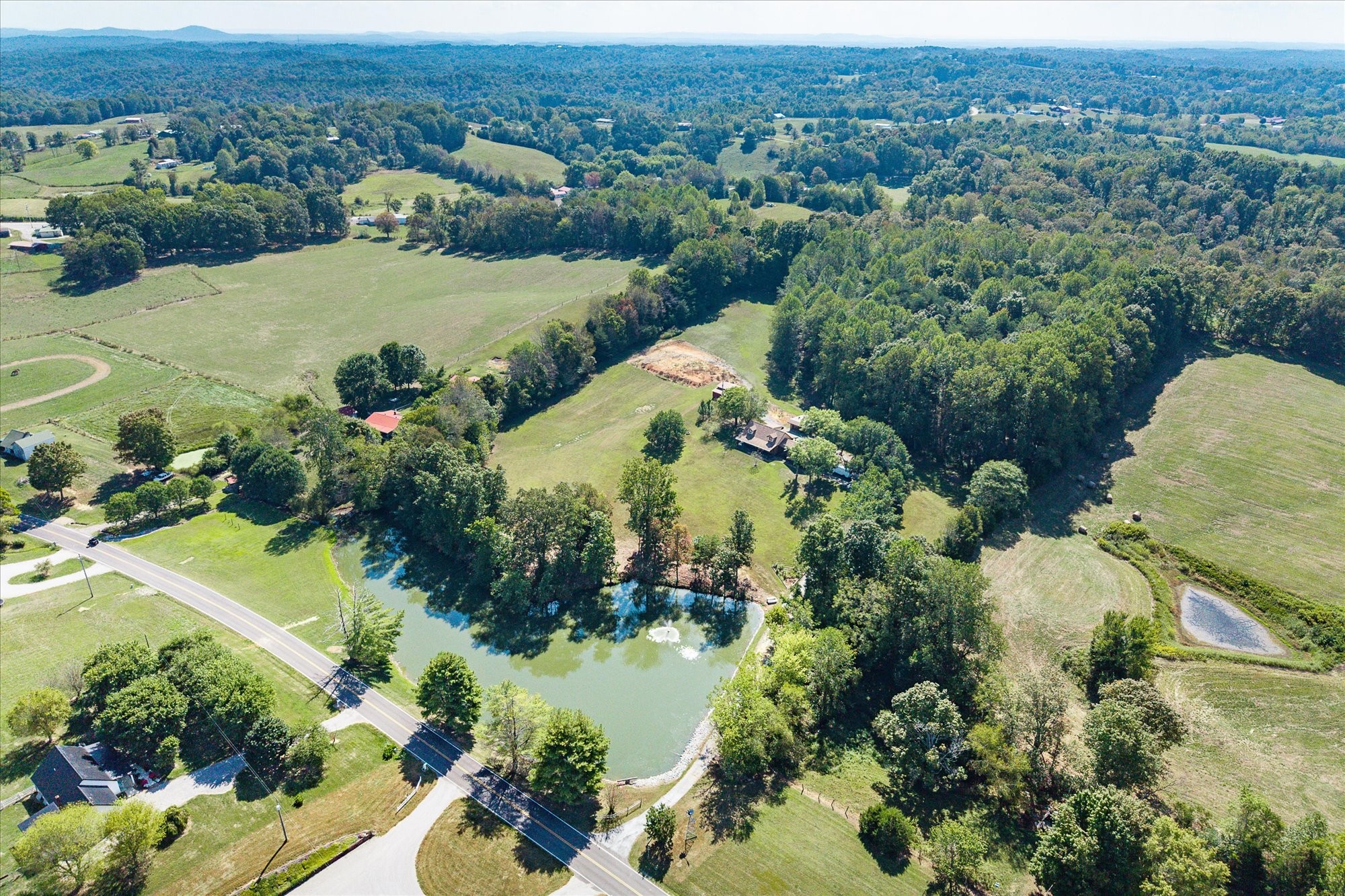 385 Paul Reecer Road Moss, TN 38575 - Photo 56 of 75 an aerial view of a house with a yard and lake view