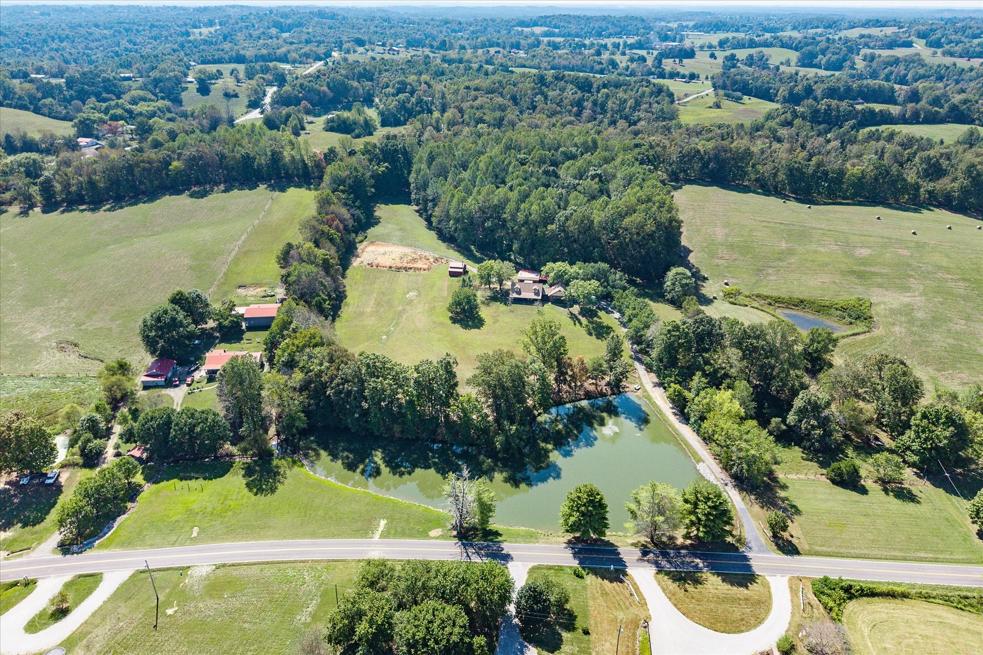 385 Paul Reecer Road Moss, TN 38575 - Photo 57 of 75 an aerial view of residential houses with outdoor space and trees
