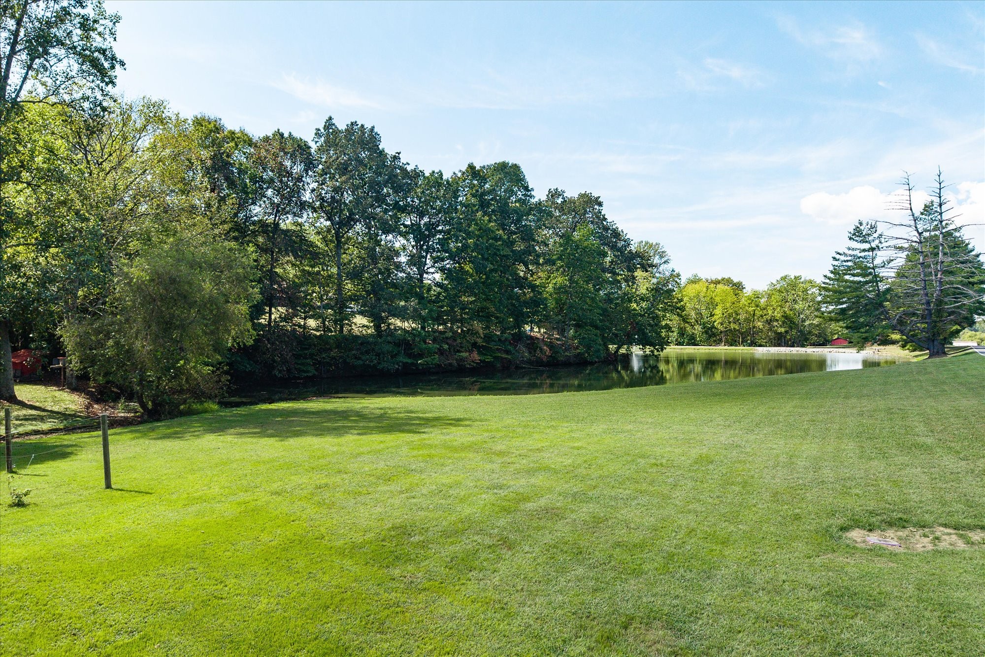 385 Paul Reecer Road Moss, TN 38575 - Photo 66 of 75 a view of a golf course with a lake