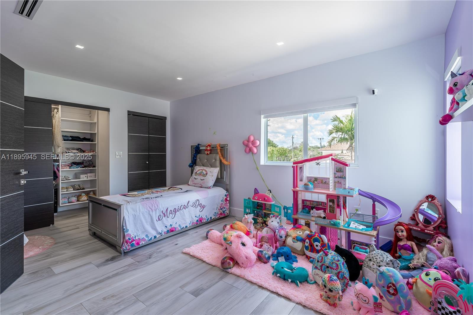 11531 Southwest 93rd Street Miami, FL 33176 - Photo 19 of 54 a bedroom with bed and a window