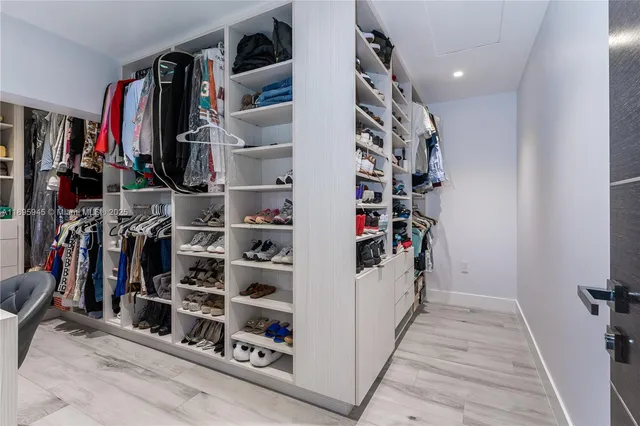 a view of livingroom with furniture window and wooden floor