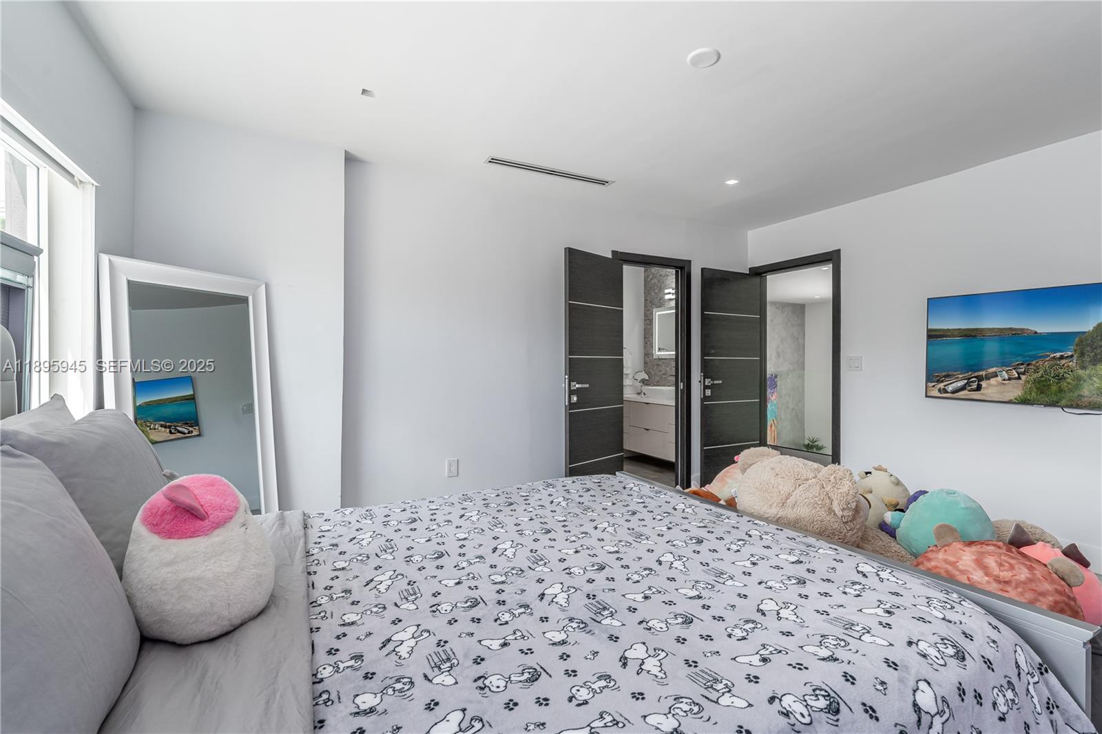 11531 Southwest 93rd Street Miami, FL 33176 - Photo 29 of 54 a bedroom with a bed and a dresser