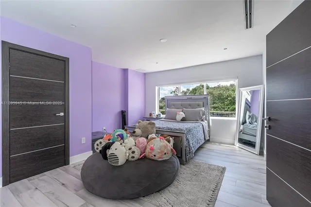 a utility room with sink dryer and washer