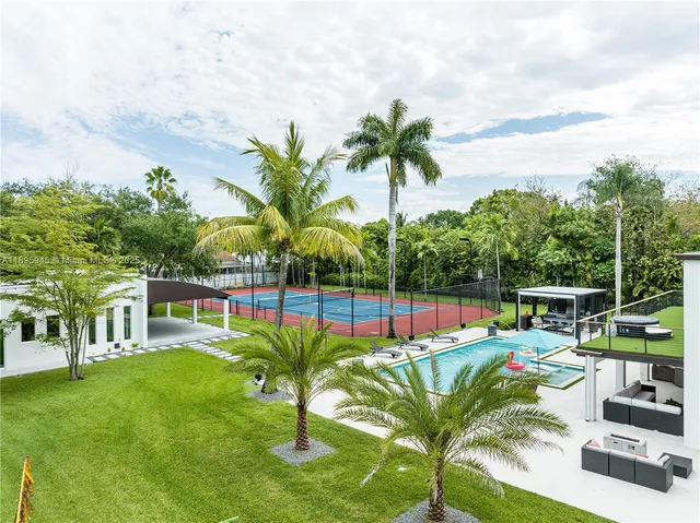 a garden view with a sitting space