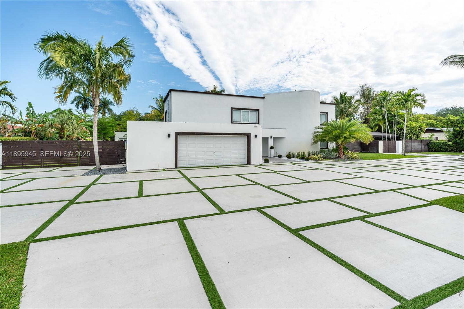 11531 Southwest 93rd Street Miami, FL 33176 - Photo 49 of 54 a house with palm tree in front of it