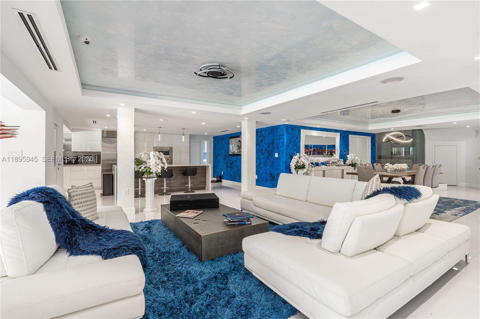 11531 Southwest 93rd Street Miami, FL 33176 - Photo 5 of 54 a living room with furniture or kitchen view and a chandelier