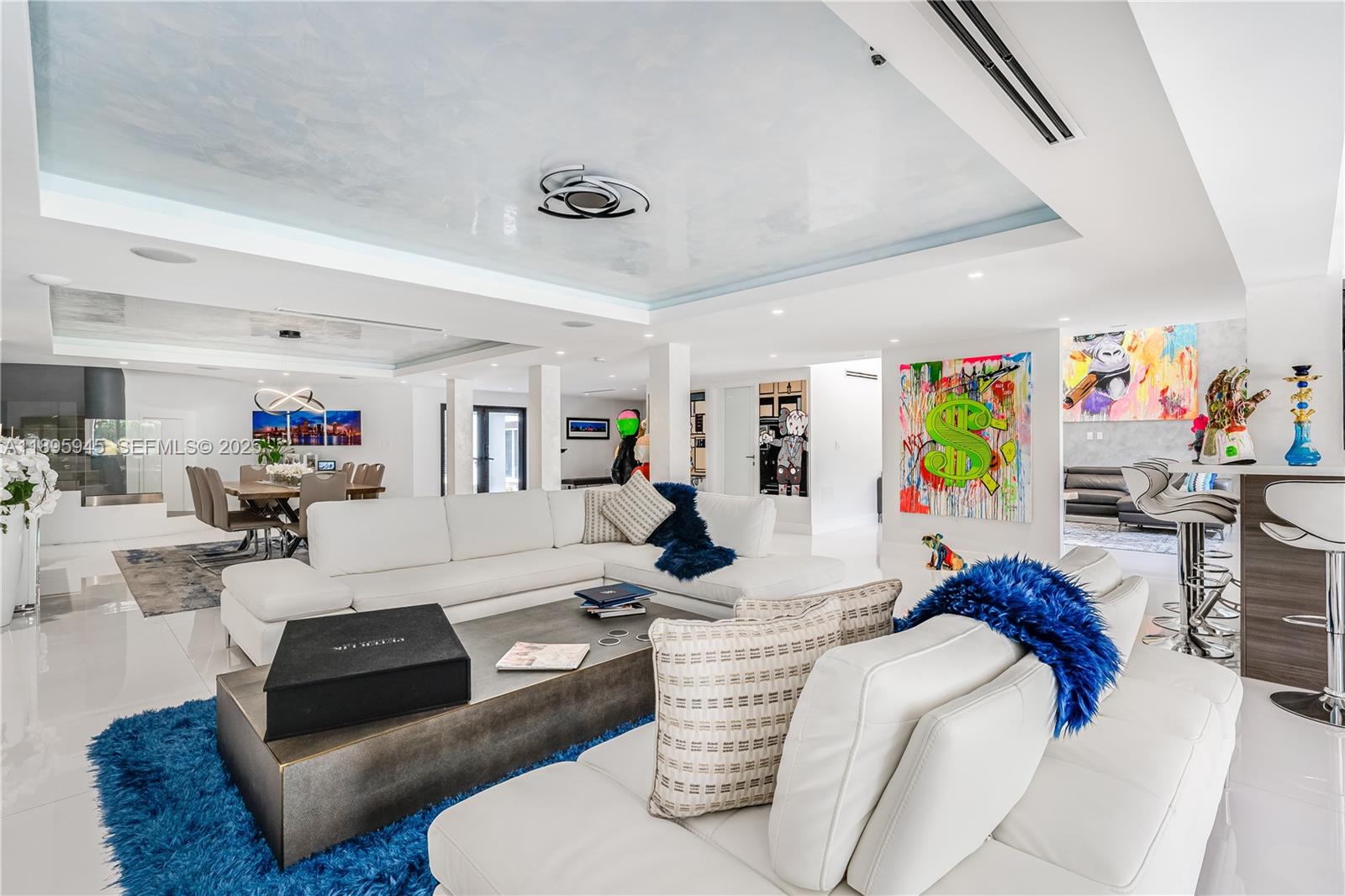 11531 Southwest 93rd Street Miami, FL 33176 - Photo 7 of 54 a living room with furniture and a flat screen tv