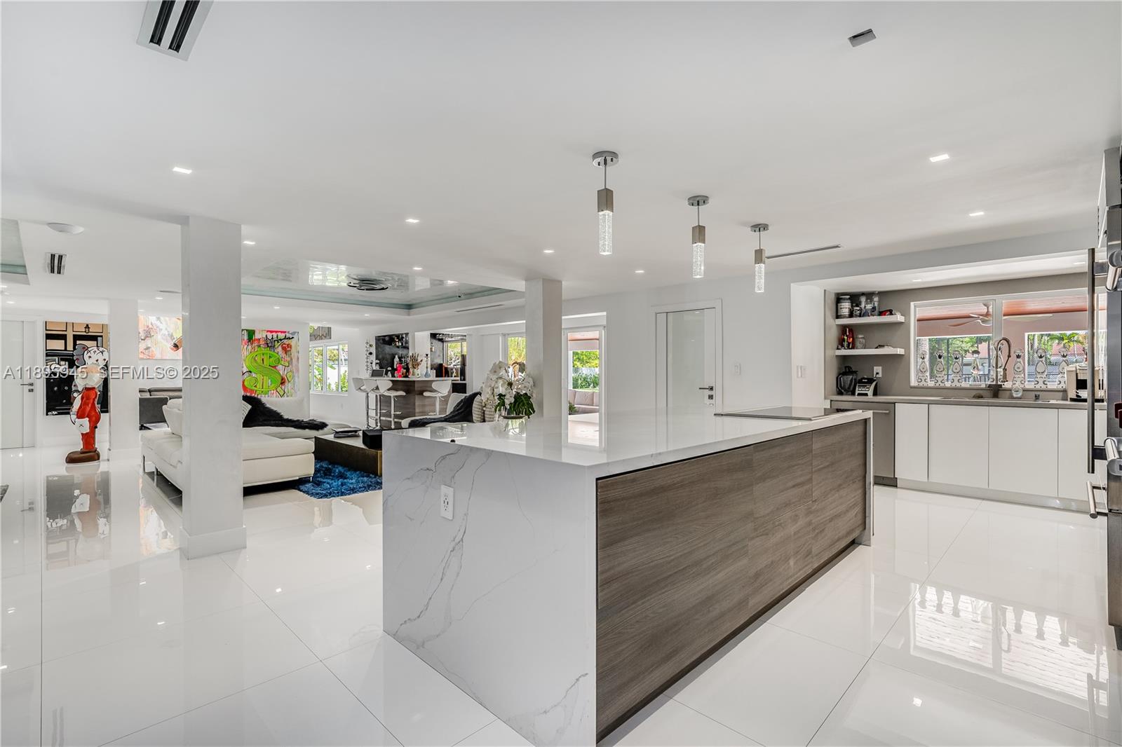 11531 Southwest 93rd Street Miami, FL 33176 - Photo 10 of 54 a large white kitchen with lots of counter space