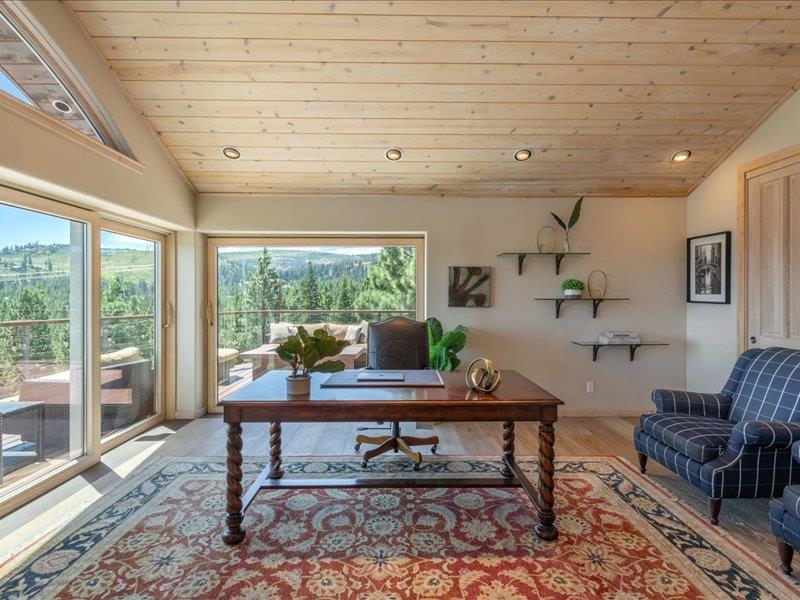 12386 Stockholm Way Truckee, CA 96161 - Photo 14 of 21 a living room with furniture and a large window