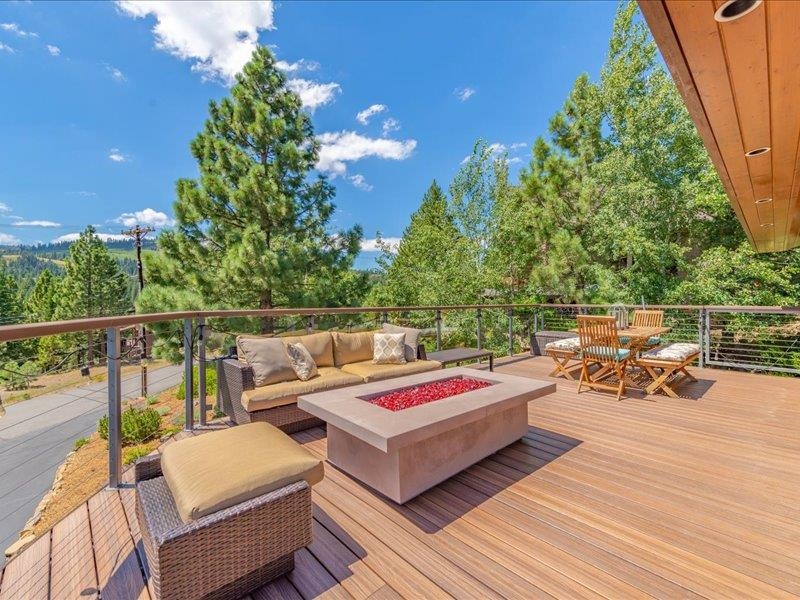 12386 Stockholm Way Truckee, CA 96161 - Photo 19 of 21 a roof deck with a potted plant and outdoor seating
