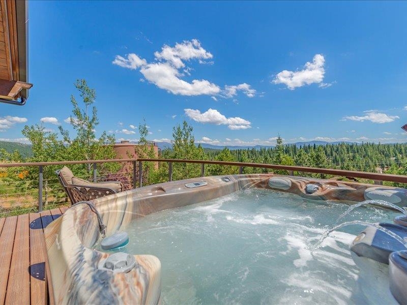 12386 Stockholm Way Truckee, CA 96161 - Photo 21 of 21 a view of a swimming pool with a lounge chairs