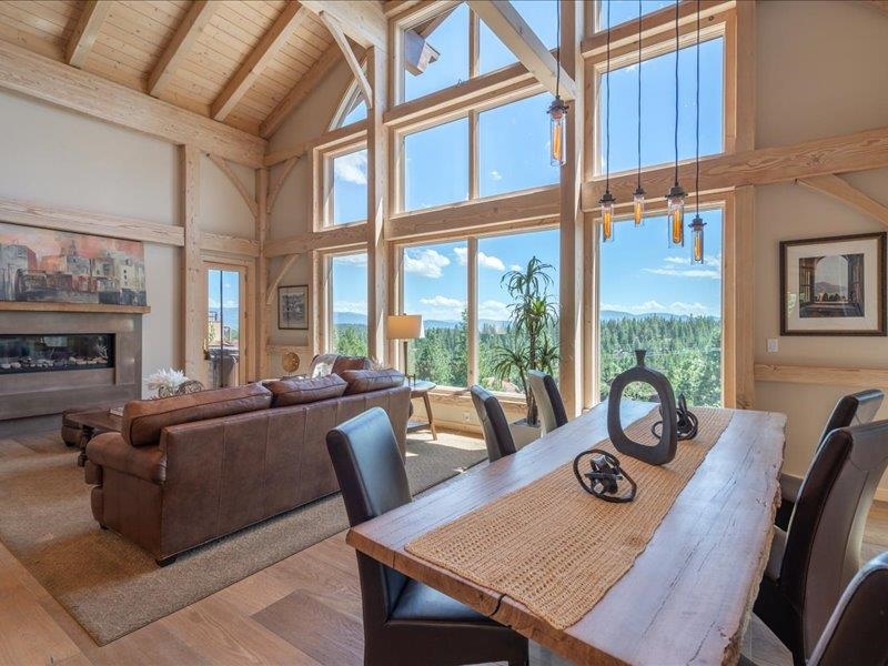 12386 Stockholm Way Truckee, CA 96161 - Photo 6 of 21 a living room with furniture floor to ceiling window and wooden floor