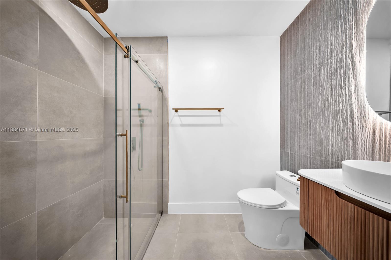 5250 Northwest 4th Street Miami, FL 33126 - Photo 20 of 41 a bathroom with a toilet a sink and shower