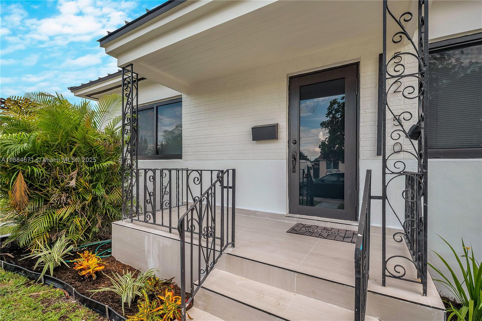 5250 Northwest 4th Street Miami, FL 33126 - Photo 2 of 41 a view of entryway