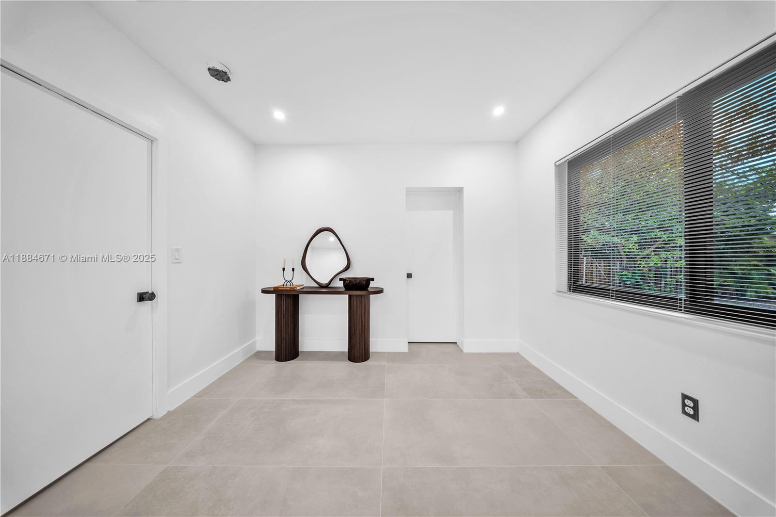 5250 Northwest 4th Street Miami, FL 33126 - Photo 24 of 41 a view of a room with swing and a window