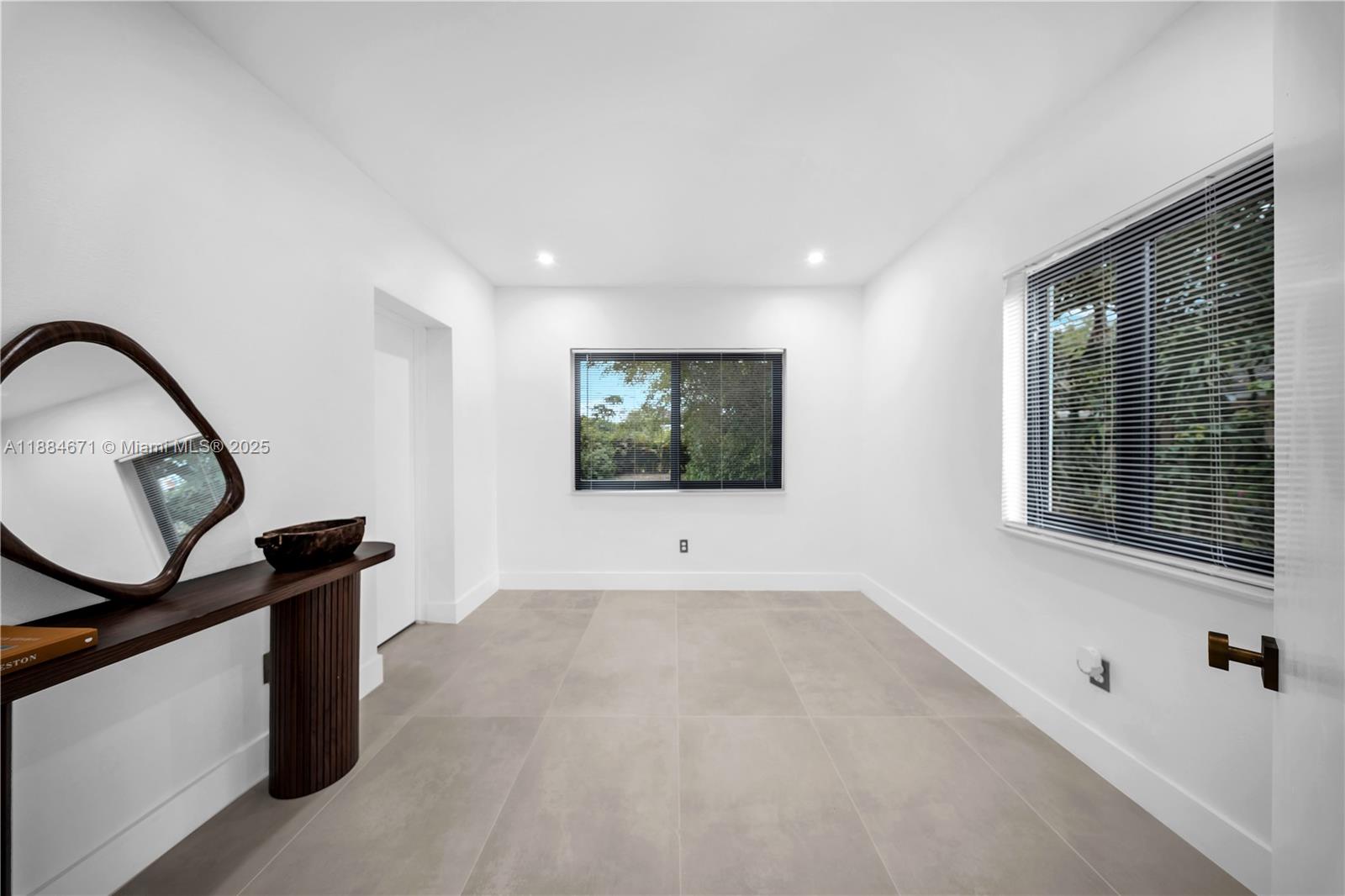 5250 Northwest 4th Street Miami, FL 33126 - Photo 26 of 41 a view of an empty room with a window