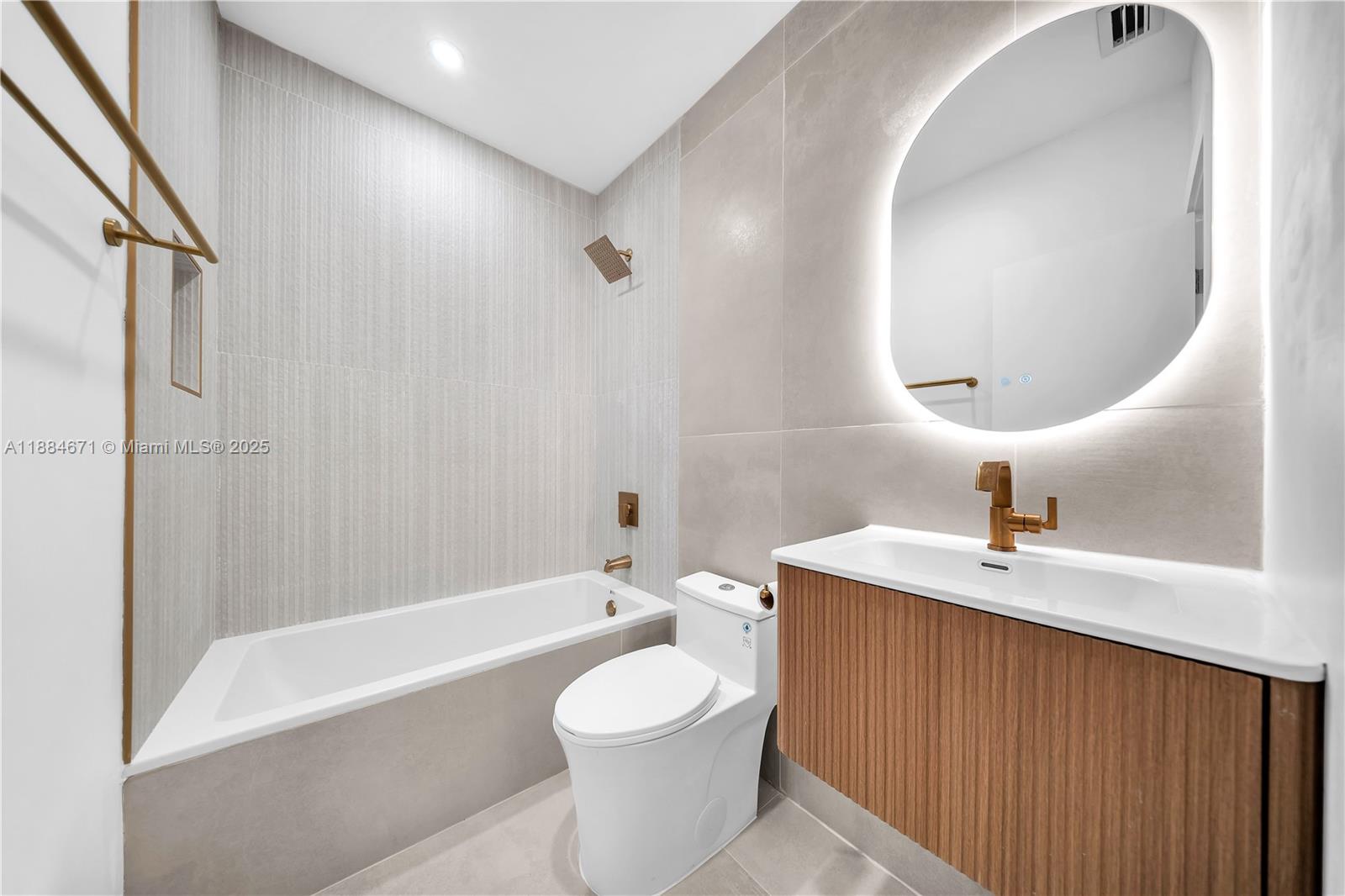 5250 Northwest 4th Street Miami, FL 33126 - Photo 27 of 41 a bathroom with a sink a toilet and shower