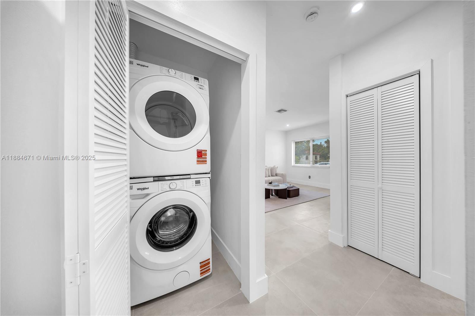 5250 Northwest 4th Street Miami, FL 33126 - Photo 34 of 41 a utility room with dryer and washer