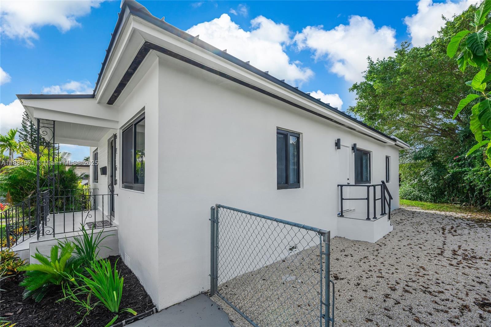 5250 Northwest 4th Street Miami, FL 33126 - Photo 38 of 41 a house view with a backyard space