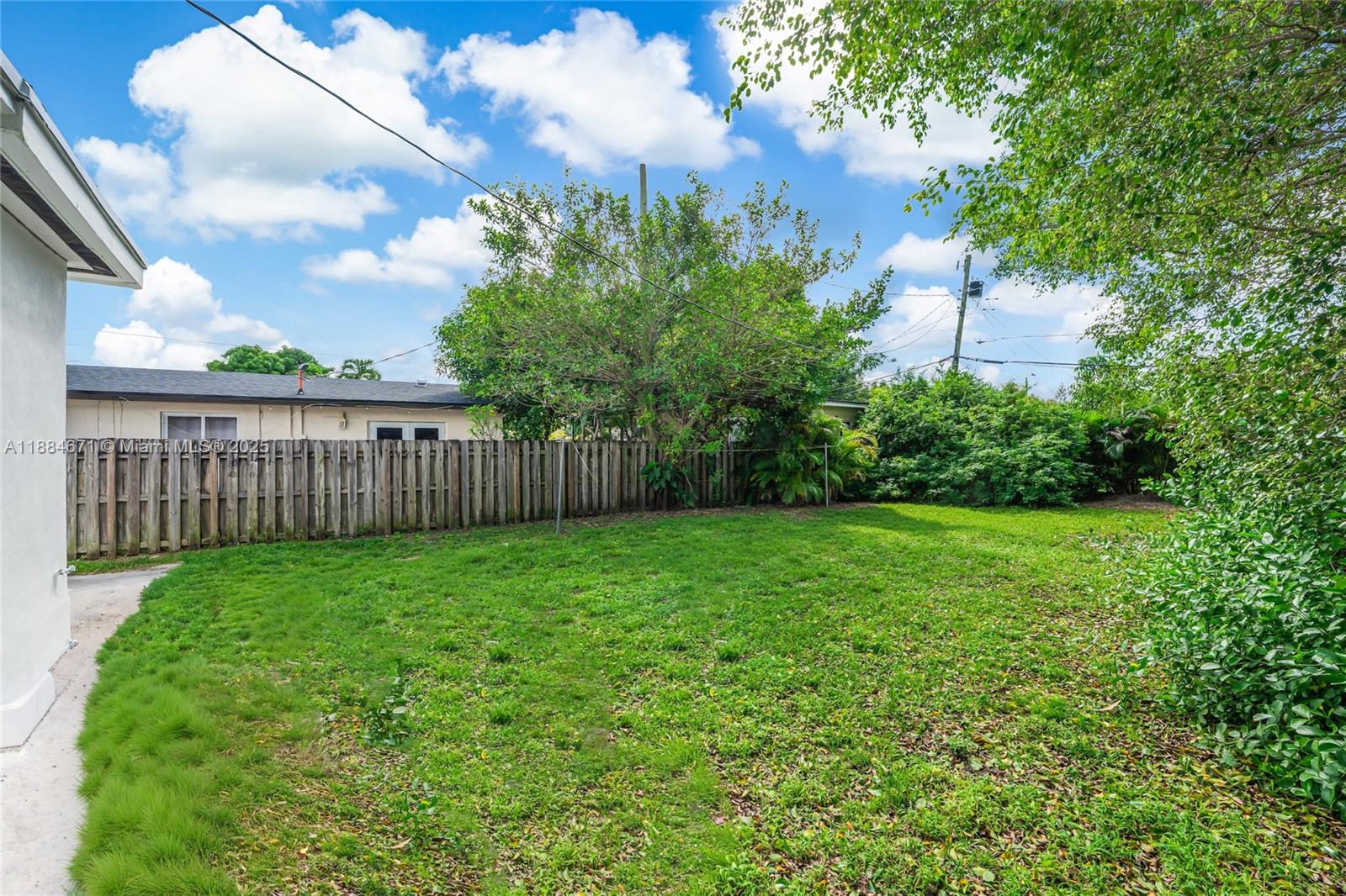 5250 Northwest 4th Street Miami, FL 33126 - Photo 39 of 41 a view of a backyard with a garden