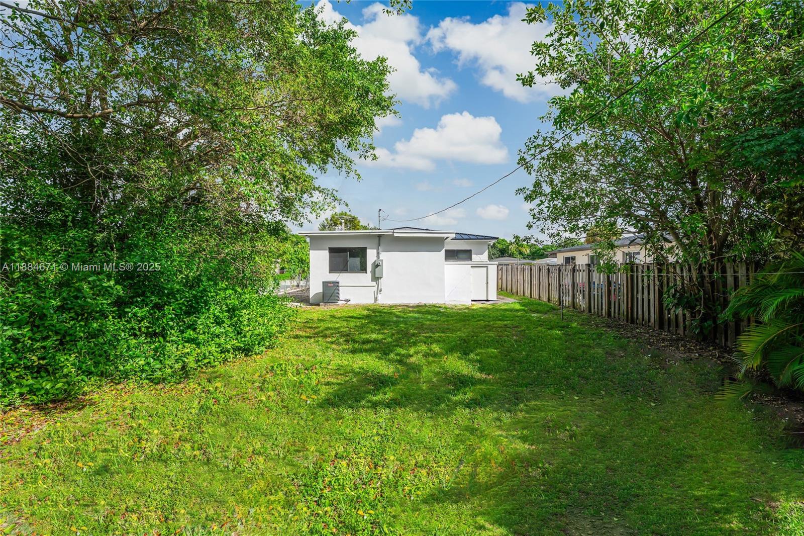 5250 Northwest 4th Street Miami, FL 33126 - Photo 41 of 41 a view of a house with backyard and garden